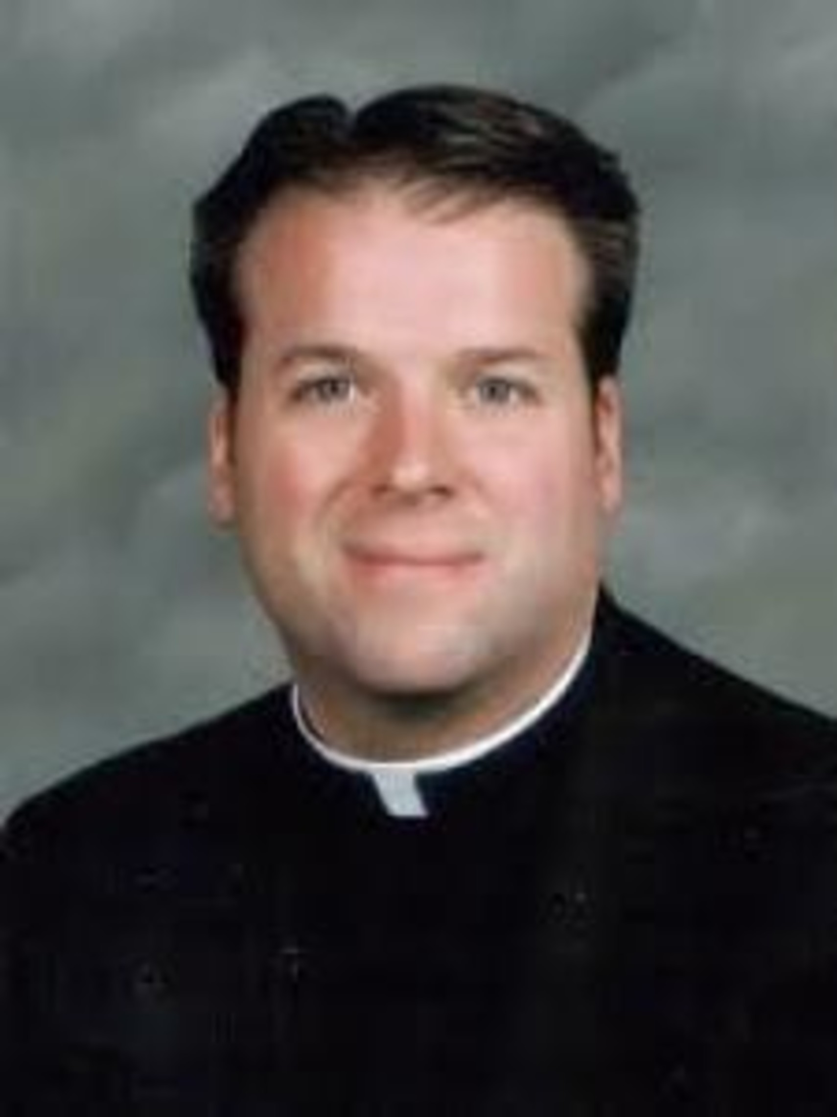 Fr. Fisher Staff Pic
